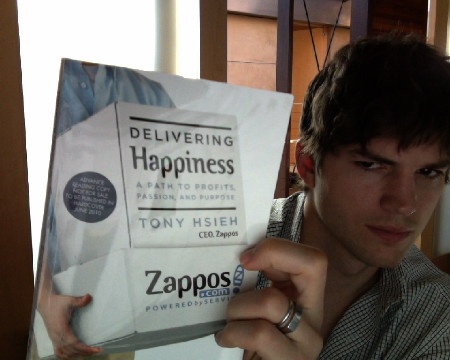 Ashton reads Delivering Happiness